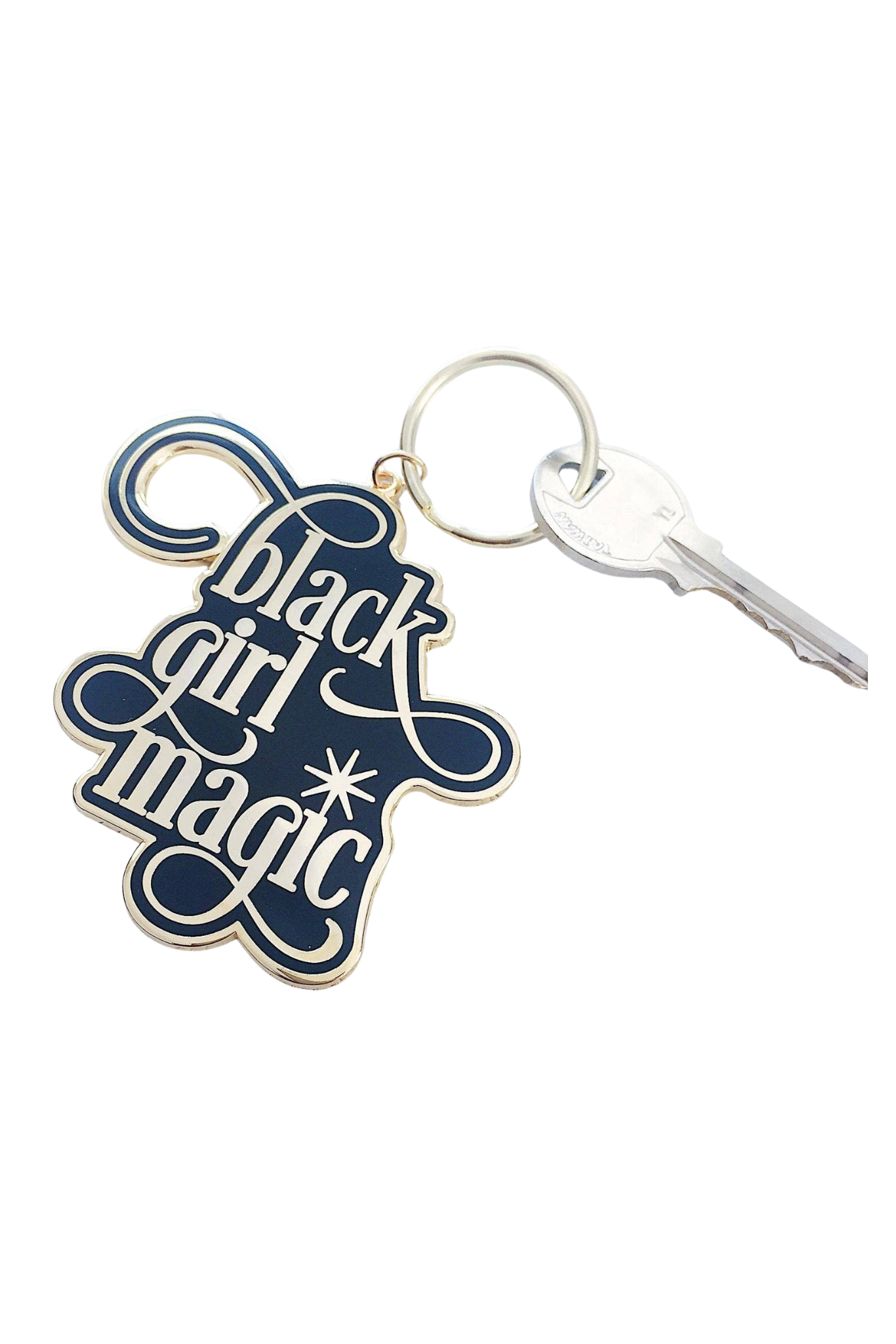 Black Girl Magic enamel keychain with a glossy finish, brass key ring, and charm, measuring 2.75 inches long.