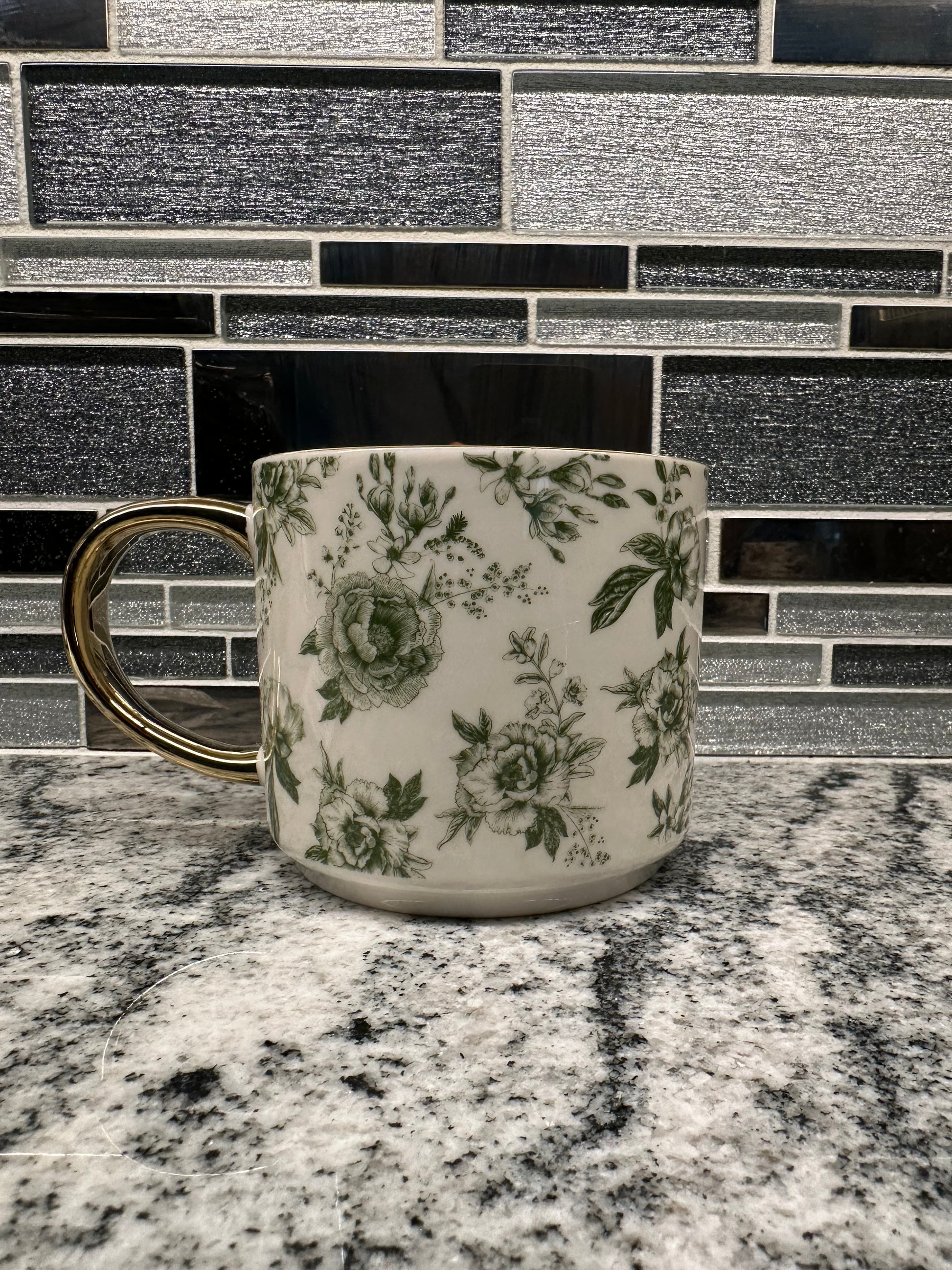 Elegant 17oz ceramic mug with green Delft design on white bone china,Gold detailed handle and botanical design on Green Delft tea mug